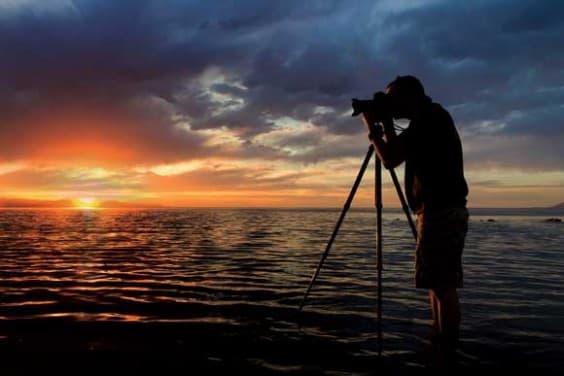 Landscape photography at night - photographer and tripod