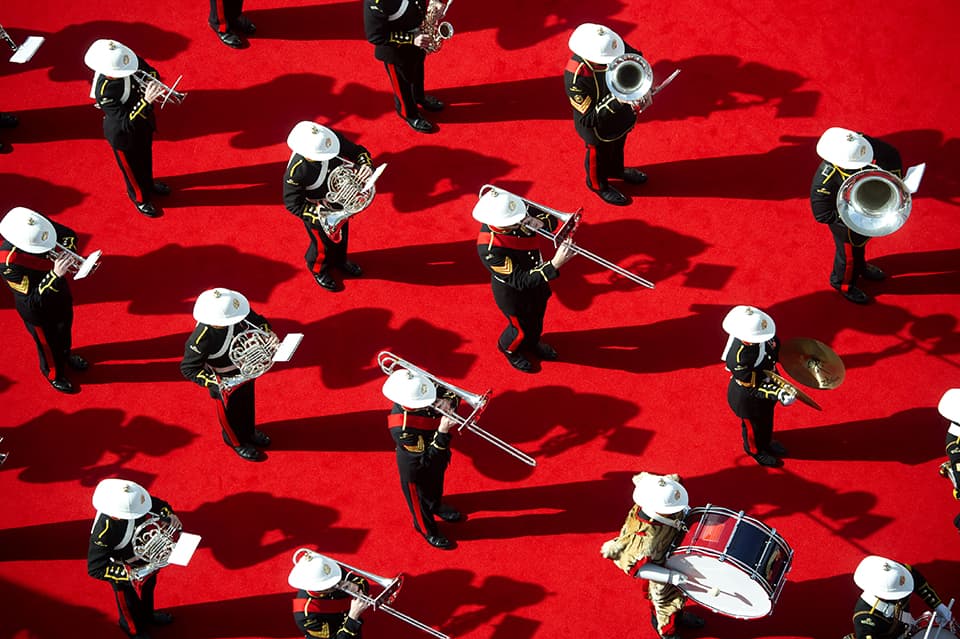 "The band of the H.M. Royal Marines playing at the launch of P&O’s ship Britannia in March 2015. I got permission from the Queens protection team to be 18 stories up on the ship during the launch. The only person outside, on the ship, at that time. The view was spectacular and the photo just jumped out at me!"