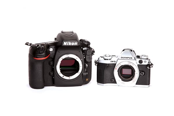 Digital cameras use a wide range of sensor sizes, with the full-frame sensor in the Nikon D810 (left) being four times the area of the Four Thirds sensor in the Olympus OM-D E-M5 II (right) and APS-C halfway in between