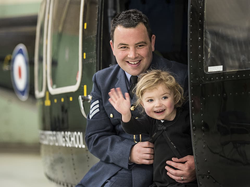 Sgt Mike Fellows graduated with other members of his multi engine advanced rotary wing course 155 from the defence helicopter flying school RAF Shawbury. Mike is now a qualified weapons systems operator (crewman) going on to fly the puma helicopter. He is seen with his very happy daughter Ivy Fellows