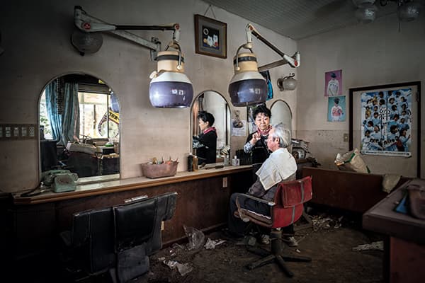 The owner of this abandoned hair salon picked up her scissors again for Bression’s camera
